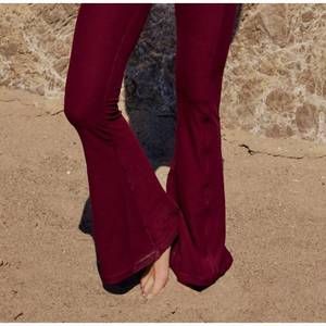 NEW WOLVEN quick-drying flare leg pants in ruby